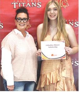Anna Head received a $1,200 Columbus Alumni Scholarship from Rebecca Spooner, at the 2025 Senior Assembly, May 16, at the Columbus Unified High School.