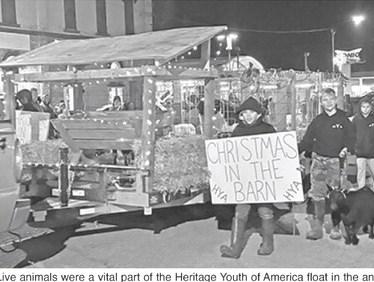 Live animals were a vital part of the Heritage Youth of America float in the annual Columbus Christmas Parade.