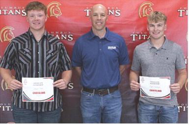 Kanyen Smith and Syler Schuberger each received an Internship Offer from Crossland Construction from Crossland Representative, Travis Sills during the 2025 Senior Assembly at the Columbus Unified High School Gymnasium, May 16.