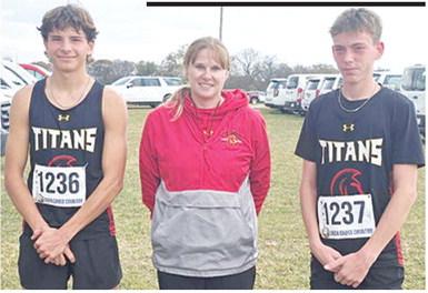 Titan Sophomores, Drake Laurance and Carter Woodcock competed at the Kansas Class 3A Cross Country Meet, Saturday in Lawrence at the Rim Rock Ranch Course. They were escorted to the meet by Head Coach Amanda Strickland. Courtesy photo.