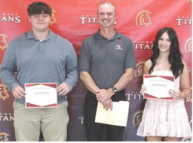 Carter Henry and Allison Burns each received a $1,000 American Bank Scholarship from bank president, Jim Gaither, during the 2025 Columbus Unified High School Senior Assembly, May 16 at the CUHS Gymnasium.