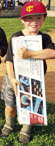 Bo Crain was the winner of the scooter in the Cal Ripken League fundraising drawing held during closing ceremonies, Tuesday. Courtesy Photo.