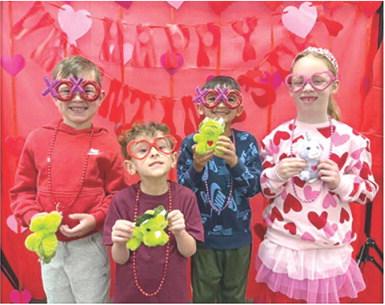 Park Elementary students Rhodes Crossland, Kingstun Taylor, Dean Flynn and Paislee Hodgson were dressed in their Valentine’s attire at their class party. Courtesy photo.