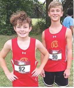 Titan eighth graders Tanner Scott (seventh place) and Eli Engelman (fifth) competed in the Oswego Cross Country Meet, September 18. Courtesy photo.