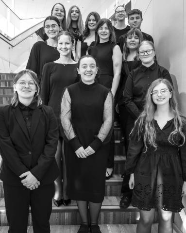 Southeast Kansas Music Educators Association District Band honorees are front to back: Madeline Graham, Ava Allison, Ava Hulvey, Ruby Stover, Madelyn Coons, Casey Dietz, Katelyn Draeger, Mackenzie Richards, Kassidy Gharmalkar, Anna Head, Marissa Lawson, Kiera Gharmalkar, and Owen Prauser. Courtesy photo.