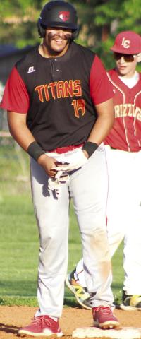 Rece Ponce, Titan Senior, stands at second on one of his three doubles recorded in the, 12-7, comefrom- behind win over Labette County, Tuesday, at the Community Field Ball Park. Ponce had three doubles and a single to collect five Runs-Batted-In for Columbus in the win.