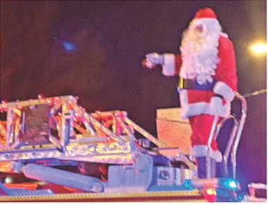 Santa made a special stop in Columbus during the Christmas parade Wednesday night. He was the grand finale of the night’s festivities as he rode through town on the Columbus Fire Department truck.