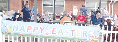 Residents and staff of Medicalodges in Columbus enjoyed the fresh air as they watched the children search for eggs at the annual Easter egg hunt sponsored by the facility.