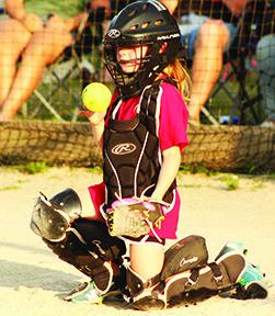 Jasmine Winninger, gets a turn behind the plate in the final Columbus Girls Softball League, eight and under game against Galena, Friday, at the Community Field Ball Park. Columbus took the win, 16-3.