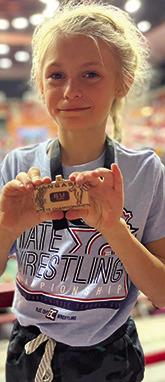Columbus six year-old Wrestling Club Wrestler, Renley Knopp, placed third in the Kansas Heartland Wrestling State Tournament, March 9, in Salina. Courtesy photo.