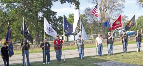 Wayne Dobkins ,Dewey Smith, Jesse Pryor, Aron Davolt, Randy Bass, Mike Wahl, Steve Jameson, Martinez and Chuck Dawe (not in order) were among those holding flags representing the various armed services during the annual Watchfire ceremony held September 17.
