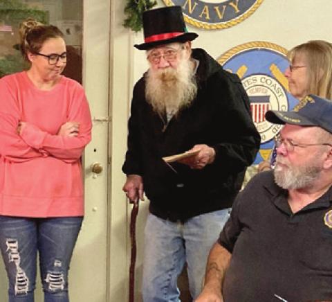 During the American Legions Post 206 Christmas Dinner in Baxter Springs, Steve and Beverly Dunn presented Jessica Brown with a memorial donation to go toward her husband, Malachi Brown’s medical expenses. Photo by Dee Riley