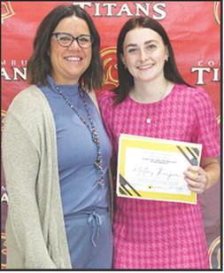 Mallory Thompson received the Columbus Community Foundation 1986 Friendship Scholarship in the amount of $500 at the Senior Assembly, May 16, in the Columbus Unified High School Gymnasium. Mallory also received the Charles and Jane Maxwell Memorial Columbus Community Foundation Scholarship in the amount of $1,000. Kelly Walters, USD 493 Title 1 Reading Specialist made the presentations.