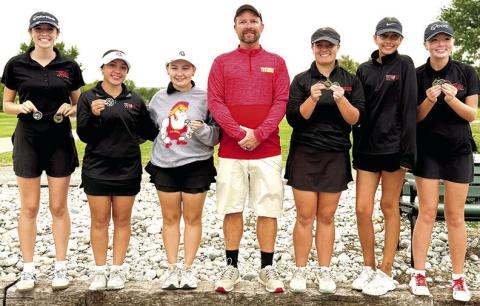 The 2025 CNC League Champions, Columbus Lady Titan Golf Team. Natalie Wary, junior; Hannah Noel, junior; Amory Neely, junior; Head Coach Jerry Smiley; Fallon Smilely, freshman; Addison Johnson, freshman; and Cali Carpino, freshman. Courtesy photo.