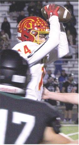 Brandon Stice, Titan Senior, pulls down a catch surrounded by a group of Prairie View Defenders in the 13-34, Columbus loss in the Kansas Class 3A Regional, Friday, in LaCygne.
