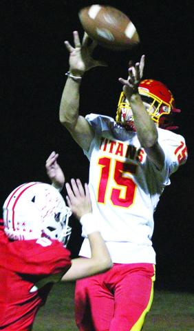 Jonas Stover, Columbus Freshman, makes a catch in the back corner of the end zone for the two-point conversion in the fourth quarter of the Titan loss to the Lions, 16-20, Monday, in Baxter Springs. Freshman quarterback, Cole Howard, connected with Stover for the touchdown leading to the conversion.