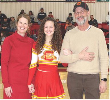 Lady Titan Senior, Ruby Stover, was recognized during Senior Night Ceremonies, February 21, at the Columbus Unified High School Gymnasium. Ruby is a one-year member of the Titan Basketball Cheer Squad, the Titan Dance Team, and Lady Titan Basketball Team. She was escorted by her parents, Holly and Craig Stover.