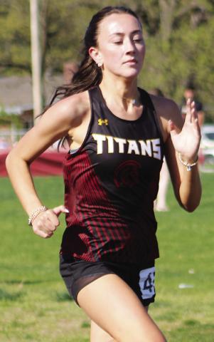 Lady Titan Sophomore, Faith Williams, competed in the 200 Meter Dash after taking first place in the girls Pole Vault event at the Columbus Track and Field Invitational Meet, Tuesday, at the Central School Campus.
