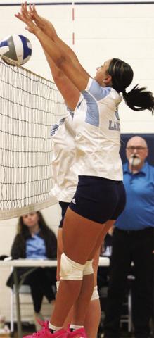 Southeast Lady Lancer Sophomore, Aubri Smith and junior, Reece Myers score a double block during Three Rivers League Night at Southeast High School, Tuesday. Photo by Jackie Scott.