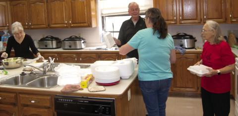 Members of the Baxter Springs Methodist Church recently held a baked potato bar fundraiser. The event drew a large amount of customers.
