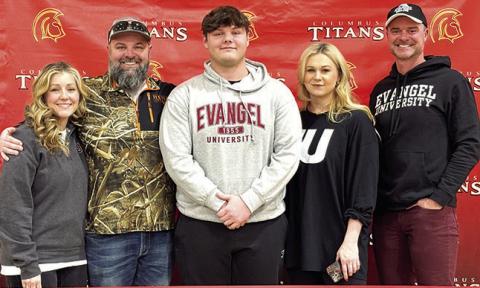 Titan Senior, Carter Henry, has signed a National Letter of Intent to continue his football career at the college level with Evangel University. Carter was joined by his parents Elizabeth and Chad Henry and Andrea and Jim Gaither and his family during a signing day held at the CUHS Gym, Friday.