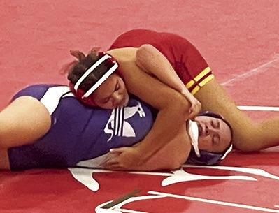 Lady Titan Senior, Brooklyn Lima, placed fifth in the Kan/Okla Tournament, Friday, at Caney Valley. She won this match by fall over Rachel Miller, Pittsburg, on her way to earning a spot on the podium. Brooklyn is now 2-3 on the young season. Courtesy Photo.