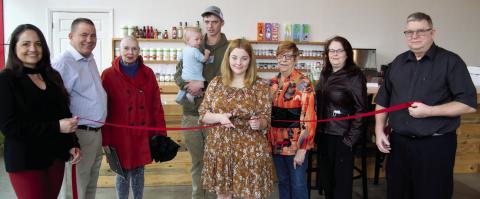 Community welcomes new business with ribbon cutting