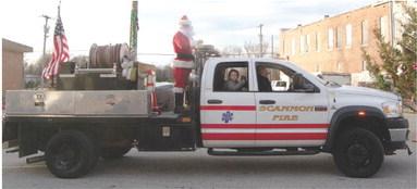 Santa made an early appearance in Scammon Sunday. He was escorted through the parade on one of the city’s fire trucks.