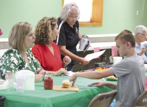 Judges help entrants develop project, communication skills