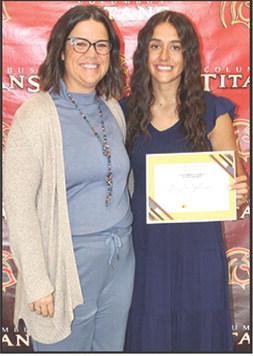 Brylie Johnson received the Columbus Cares Columbus Community Foundation Scholarship in the amount of $500 at the Senior Assembly, May 16, in the Columbus Unified High School Gymnasium. The presentation was made by Kelly Walters, USD 493 Title 1 Reading Specialist.