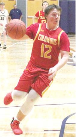 Titan Junior, Ethan Midgett, gets a steal late in the fourth quarter and drives to the basket to help seal the road win for Columbus in Galena, 48-36, Friday.