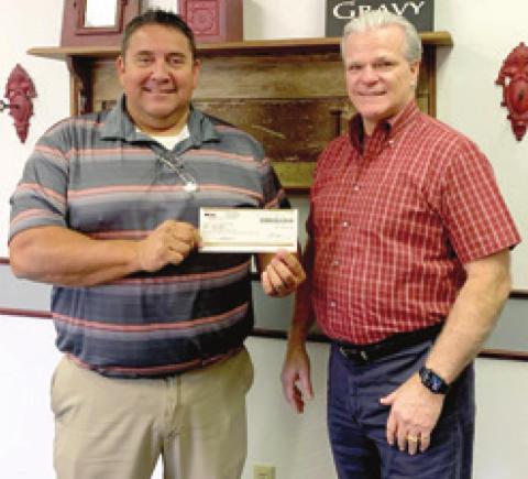 Baxter Springs USD 508 receives dividend check