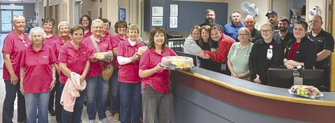 After the May 19 meeting of the Columbus Mercy Auxiliary, members presented the staft at the hospital with fruit trays made by Auxiliary member Bobbi Martin. The trays were in appreciation of the staff and all they do for the community. Courtesy photo.