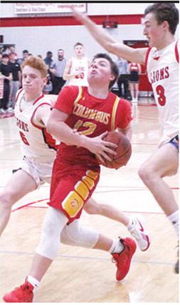 Titan Junior, Ethan Midgett, drove coast to coast following a steal but was fouled on his way to the basket by Baxter Springs Junior, Logan Abbott. Junior, Caleb Grant was also in on the chase. Ethan lead Titan scoring with 17 points in the 48-46 win in Baxter Springs.