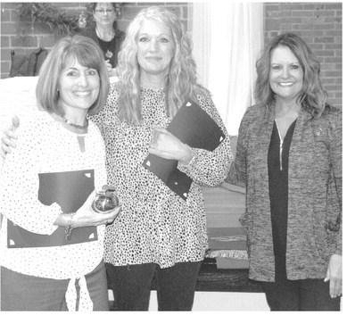 The Golden Apple Award is presented to an instructor in pre-kindergarter through sixth grade and seventh grade through twelfth grade, plus Coffeyvilk Community College, Columbus campus, in the USD 493 District. Previous Golden Apple nominees in the elementary school included Suzette Henderson anc Stephanie Evans. Kari Soper (right) Coffeyville Community College Columbus Campus director, presented the Golden Apple to Henderson.