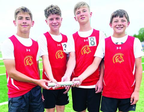 The Columbus Titan Seventh Grade 4x800 Meter Relay Team set a new school record at the Girard Invitational Track and Field Meet, April 17. Team members Blaze Bowman, Evan Walters, Eli Engleman, Cam Carter completed the race with a time of 11:13.7 minutes beating the 2002 record of 11:38 minutes set by Chet Mercer, Cory Burton, Chris Wells, and Cody Morris. Courtesy photo.