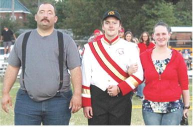 Senior, Gabe Edwards, was recognized during Senior Night Ceremonies at Titan Stadium, October 17. Gabe is a four-year member of the Titan Band. He was escorted by his parents Matthew Edwards and Sarah Sattazahn.