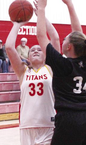 Lady Titan Seventh Grader, Gracie Stanley, scored to tie the game, 10-10 in the third quarter of the 1210 loss to Frontenac, Tuesday, at the Central Gym.