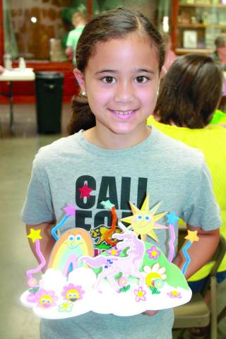 Glittering Stones 4-H Club member Kayelynn Adoremos earned three purple ribbons and a blue ribbon in the Visual Arts and Crafts classes during the cherokee County Fair.