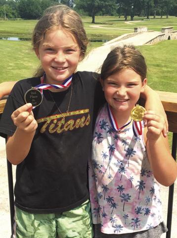 Lyndee Smiley took second place behind sister Alaina Smiley in the girls 9-11 age group at the Parsons SEK League Junior Golf Tournament, Thursday, at the Katy Golf Course in Parsons. Courtesy Photo.