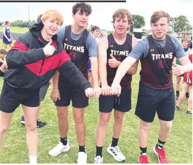 Titan Junior, Gavin DePratt and seniors, Jonah Smith, Kyler Rahmeier, and Brandon Stice stepped out of the field and onto the track to take first place with a time of 50.6 seconds in the 400 Meter Throwers Relay at the Northeast High School Track and Field Meet, Tuesday, in Arma. The CUHS Athletes normally compete in field events but took to the track for the special race specifically for them. Complete results can be found on page 7 of today’s News-Report. Courtesy photo.