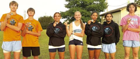 Zayne Gabern, Tucker Sutton, Jackie Robinson, Kendyl Renn, Journee Rimmer, Zack Whittenburg, and Michael Smith were the individual medalists for the Southeast Lancers in their home cross country meet, Thursday, at the Weir Baptist Church Camp. The Lancer Varsity Boys Team placed second in the team standings. See complete results on page nine of today’s News-Report. Courtesy photo.
