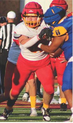 Lineman, Kash Smith, Titan All-State Sophomore, fends off a Parsons Lineman, during the four-team Jamboree Scrimmage in Girard, Friday.