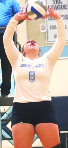 Senior, Natalie Wells, set up her team mates for 25 assists to help win two matches on the opening night of league play at Southeast High School, Tuesday. Photo by Southeast High School Yearbook Staff.