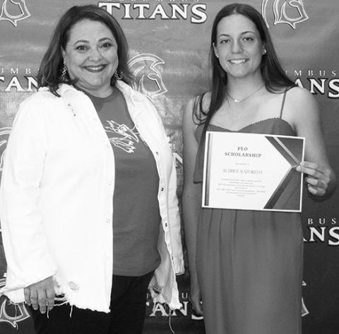 Aubree Saporito was the recipient of the PEO Scholarship in the amount of $500 awarded by Rebecca Stone, during the Senior Assembly at the Columbus Unified High School Gymnasium, May 18.