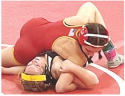 Sophomore wrestler, Montana Ortberg, won by fall over, Josslyn Miller, Fredonia, at the Lady Titan Wrestling opener, Friday. Montana scored seven team points for Columbus in the Kan/Okla Tournament at Caney Valley High School. Courtesy Photo.