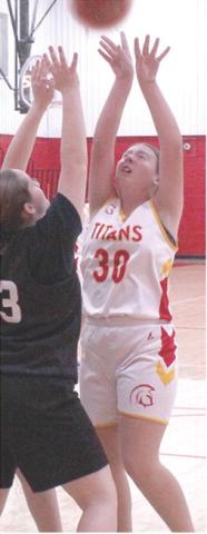 Lady Titan Seventh Grader, Temperance Goff, goes up for two points in a recent home game against Frontenac at the Central School Gymnasium. Temperance led Columbus with four points in their November 25 loss to Girard, 12-39, in their final home game of the season on the Central Court. The Lady Titans wrapped up their 2024 regular season schedule last night at Baxter Springs, They will play in the CCCJL Tournament, December 16 and 19 at Frontenac.