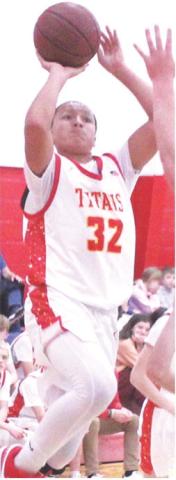 Josiah Palmer, Titan Freshman, goes up for a shot in the junior varsity loss to St. Mary’s-Colgan, 25-67, Friday, at the Central School Gymnasium.