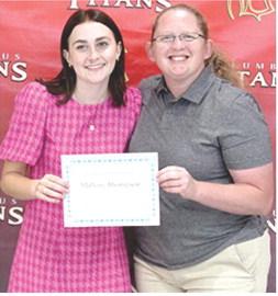 Mallory Thompson received the Student Council Scholarship for $500 from Columbus High School StuCo Sponsor, Christine Lovell, during the 2025 Senior Assembly, May 16, at the CUHS Gymnasium.