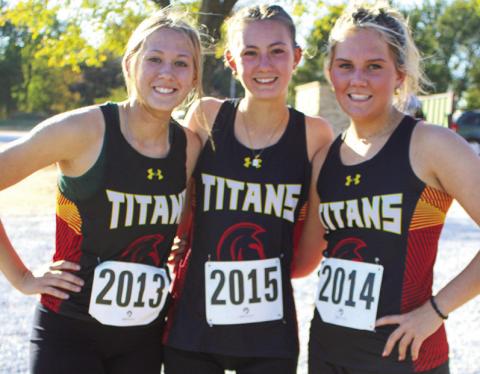 Lady Titans Cara Atlis, sophomore, Darcy Garett, senior, and Kenadie Carter, senior, ran in the CNC League Cross Country Race at the Columbus Brush Creek Golf Course, Thursday.